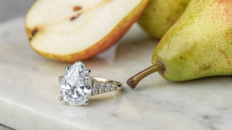 The Ultimate Guide to Wearing a Pear Shaped Diamond Ring: Style, Symbolism, and More