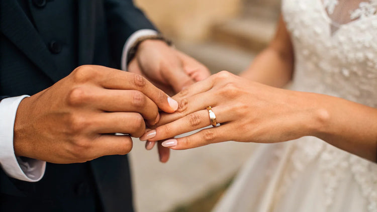 Should Your Wedding Ring Go On First?