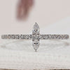 Pear diamond wedding band in white gold.
