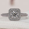 Round halo engagement ring with a stunning diamond centerpiece.
