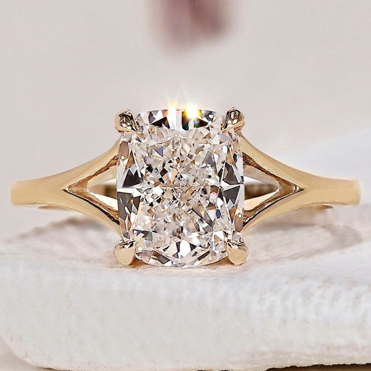 Elongated Cushion Cut Diamond Ring with split shank ring design.
