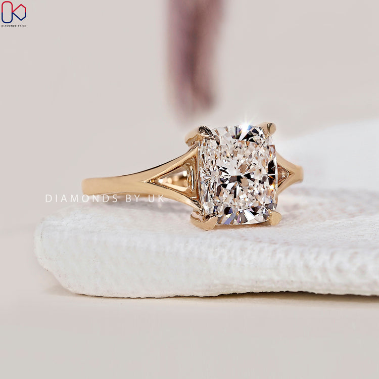 4 prong claw setting showcasing the beauty of an elongated cushion cut diamond.
