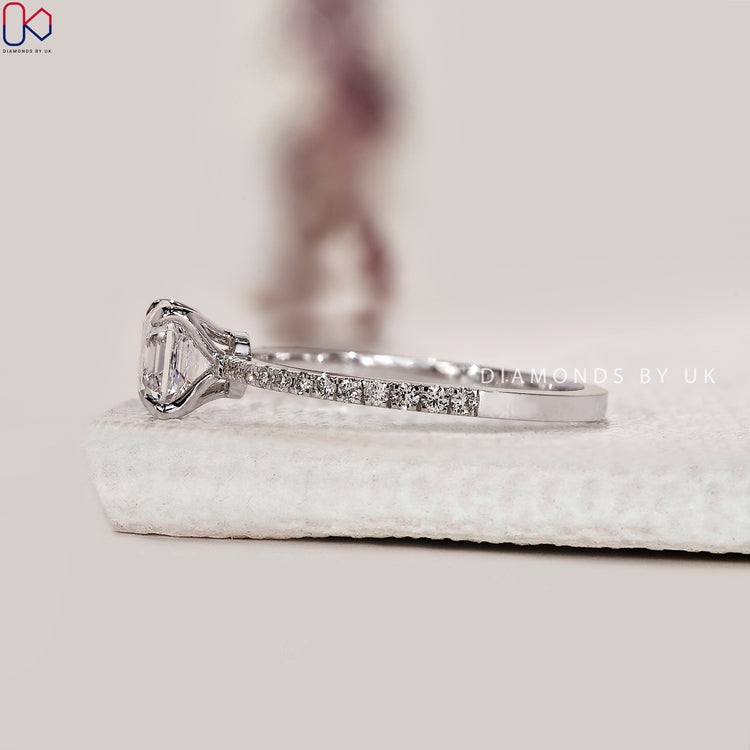 Handmade Asscher cut ring with round diamond pave.
