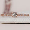 Pave setting ring with a stunning round diamond engagement ring design.
