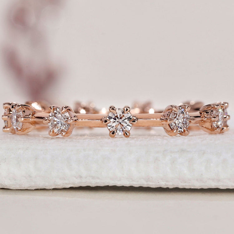 Eternity band featuring round diamond wedding band for a timeless look.
