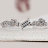 White gold diamond band styled with baguette diamond band details.
