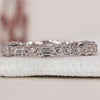 Elegant White Gold Eternity Band featuring sparkling diamonds in a timeless design.
