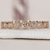 Diamond eternity band featuring a stunning round diamond wedding band design.
