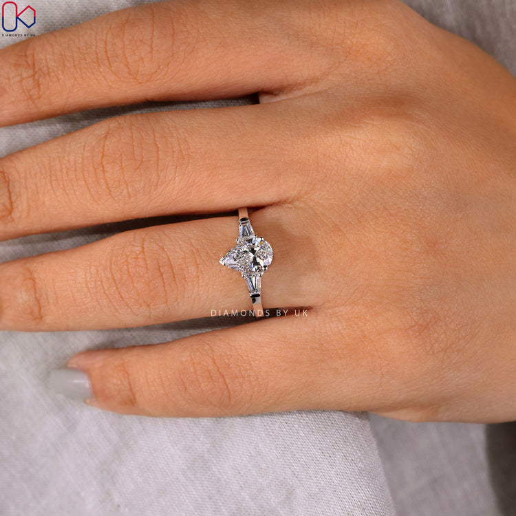 Handmade engagement ring with white gold and V prong setting.
