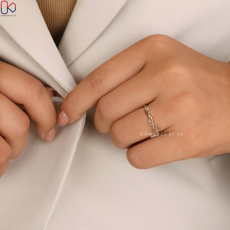 A handmade jewellery piece: a twisted diamond wedding band by Diamondsbyuk.