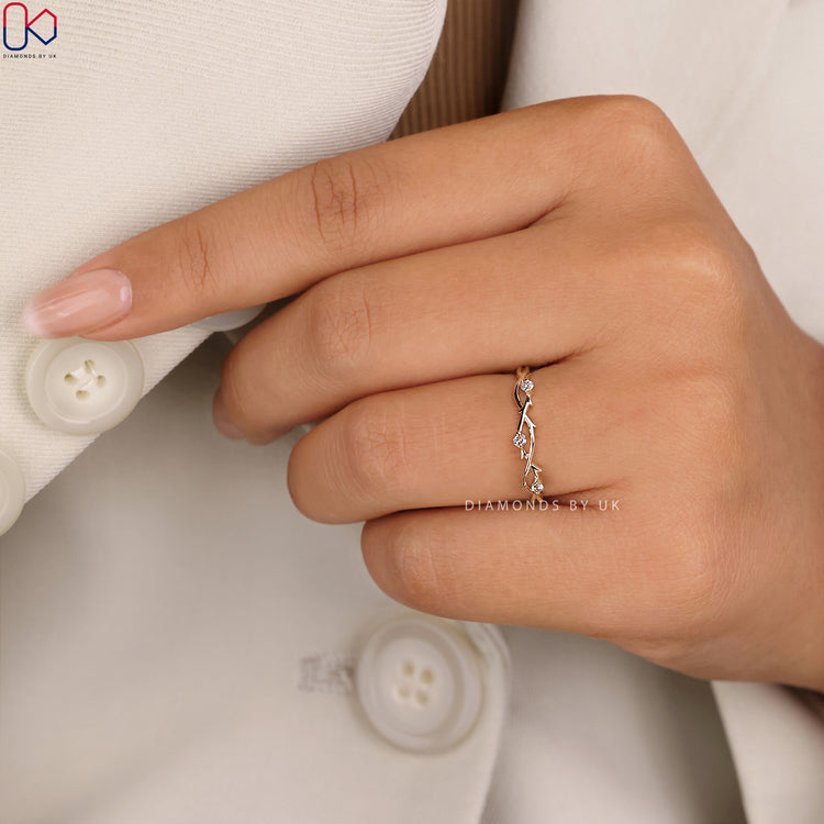 A nature inspired wedding band crafted by Diamondsbyuk, reflecting timeless beauty.