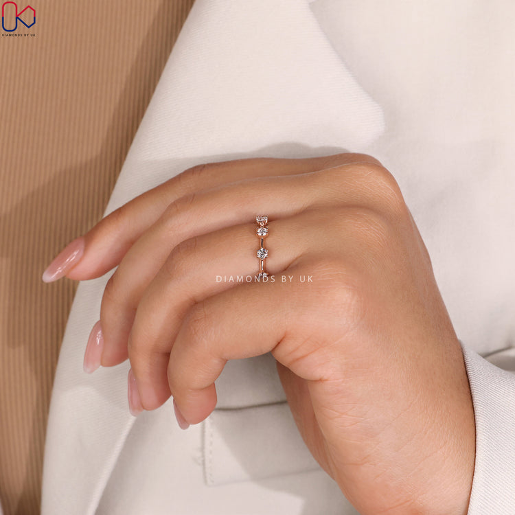 Rose gold diamond wedding band with a dazzling eternity design.
