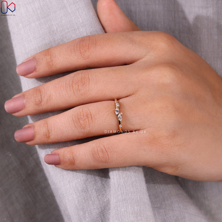 Lab Grown Diamond placed in dainty wedding band and gold design.