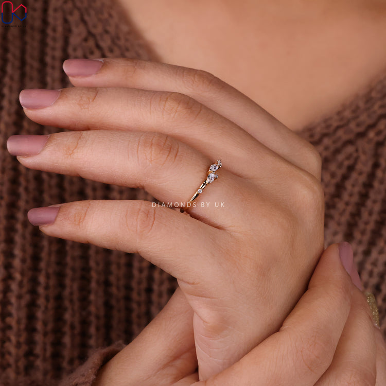 Prong set wedding band created in marquise and round wedding band style.