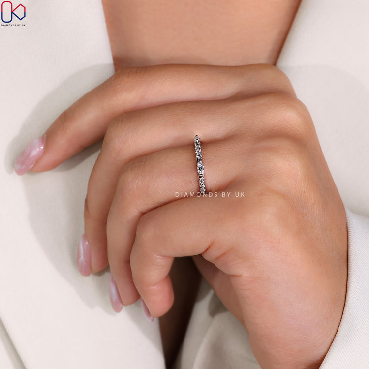 Handmade band with marquise wedding band.
