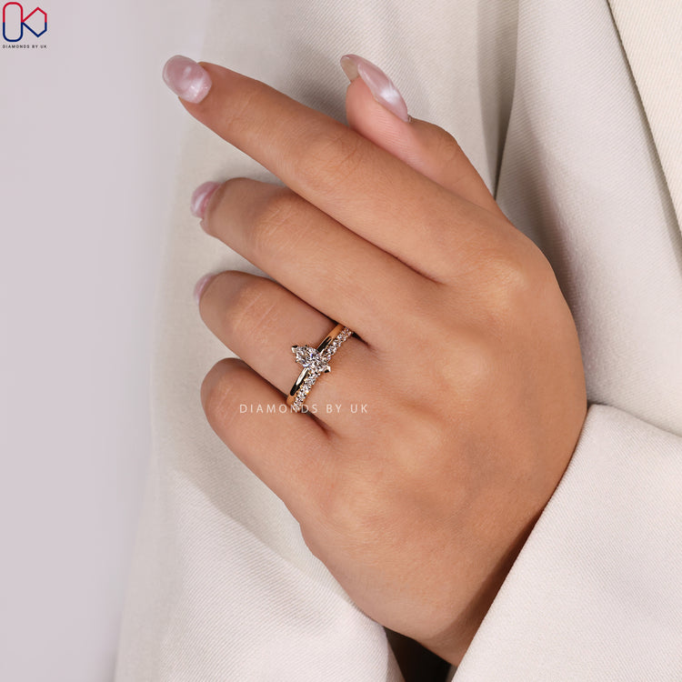 DiamondsbyUK bridal set crafted with precision and care.