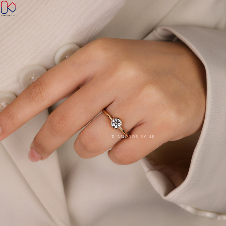 Yellow gold engagement ring with handmade ring.
