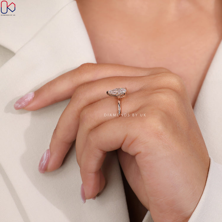 Prong Setting Ring that enhances diamond brilliance.
