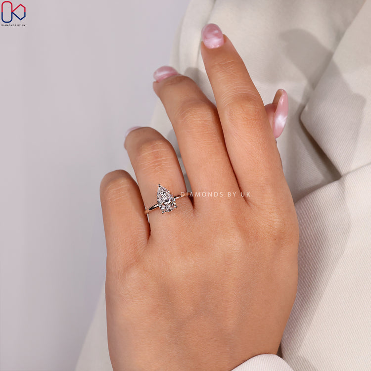 DiamondsbyUK Engagement Ring with timeless charm.
