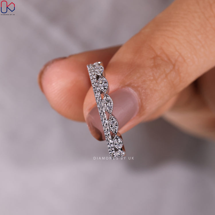 Lab Grown Diamond placed in a white gold diamond band setting.
