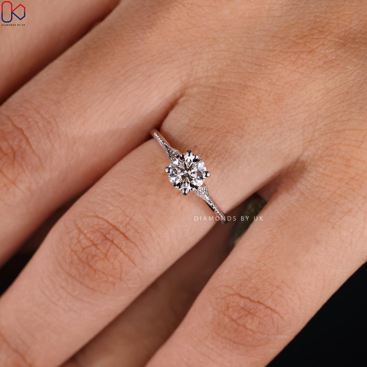 IGI certified round cut diamond ring for assured quality and authenticity.
