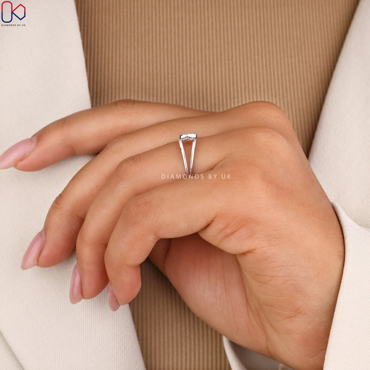 Lab grown diamond ring with open white gold band.
