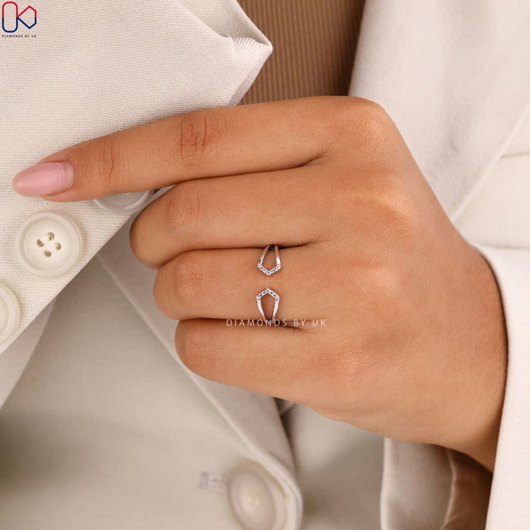 Handmade ring with round diamond in cuff style.
