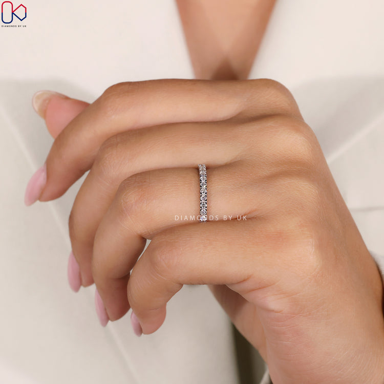 Minimalist wedding band crafted in sleek white gold for a modern look.
