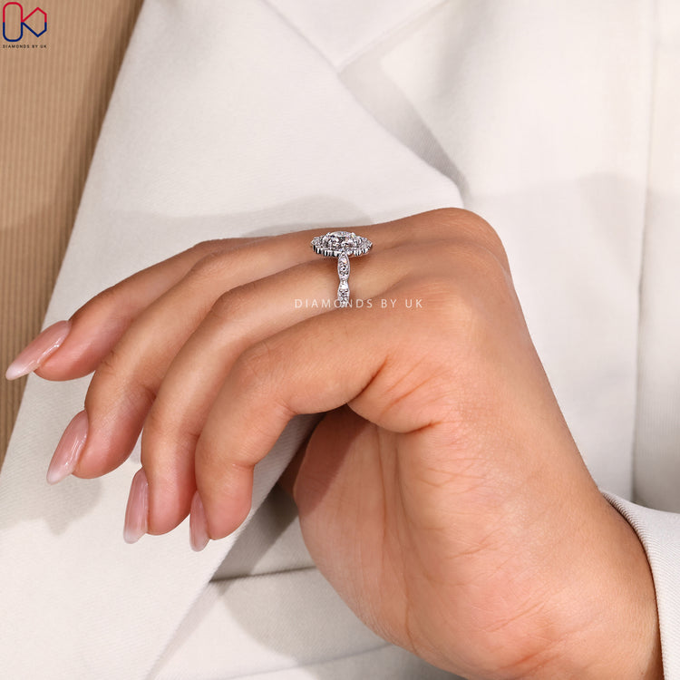 Round cut pave setting ring with handcrafted design.
