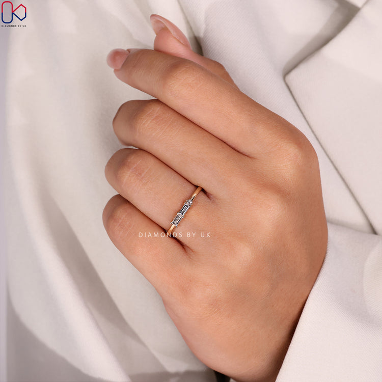 Handmade jewelry with a yellow gold diamond wedding band for a personal touch.
