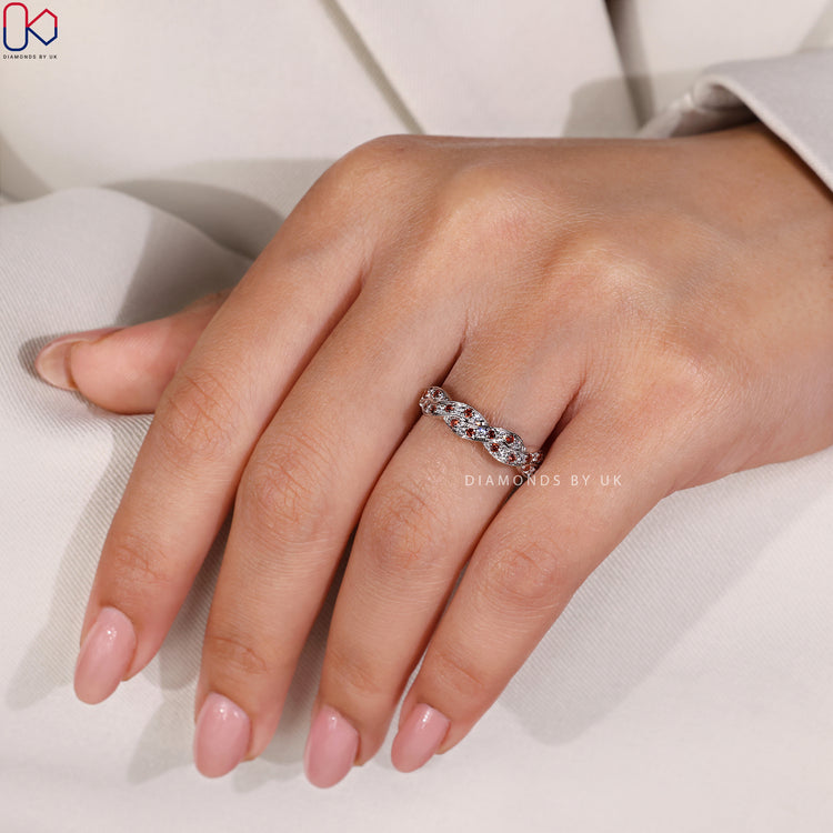 Lab grown diamond twisted wedding band with eco-friendly diamonds.
