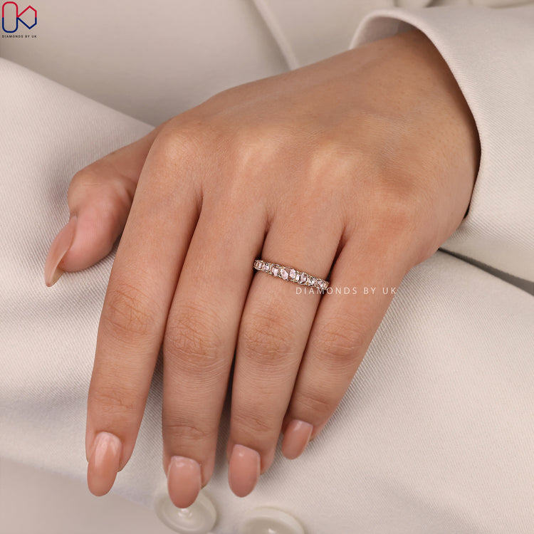 Buy wedding band featuring rose cut diamonds in a beautiful setting.
