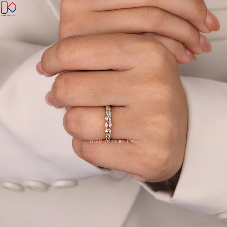 Half eternity band with rose cut diamonds for a timeless look.

