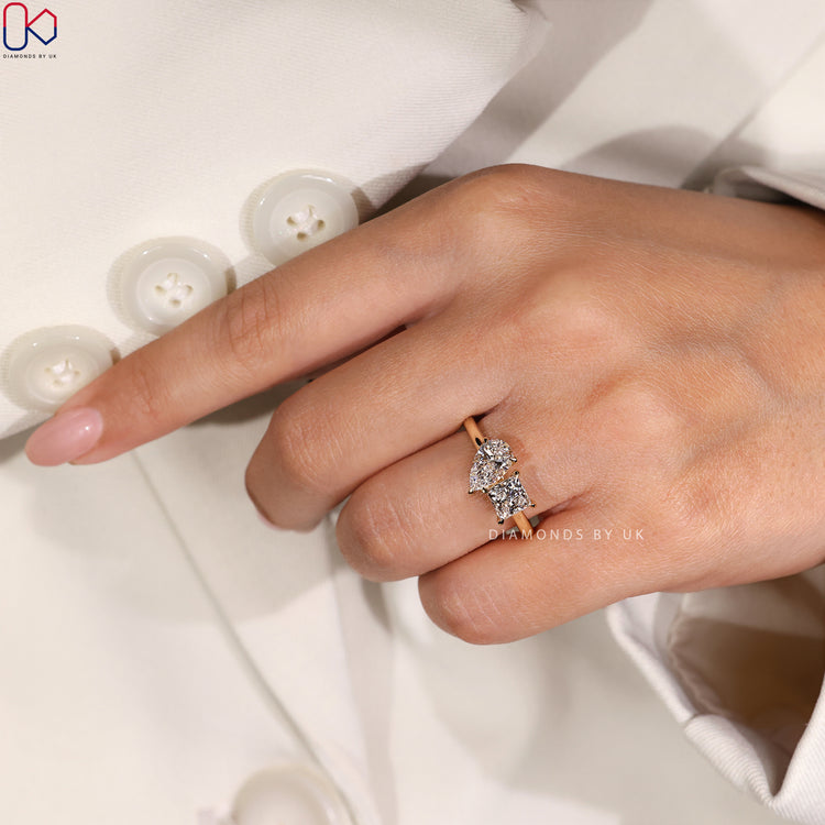 IGI Certified Pear & Princess Cut Diamond Ring.
