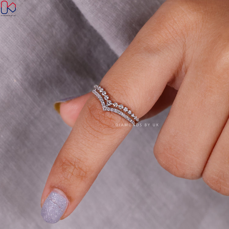 Round cut diamond band blended with prong set wedding band.
