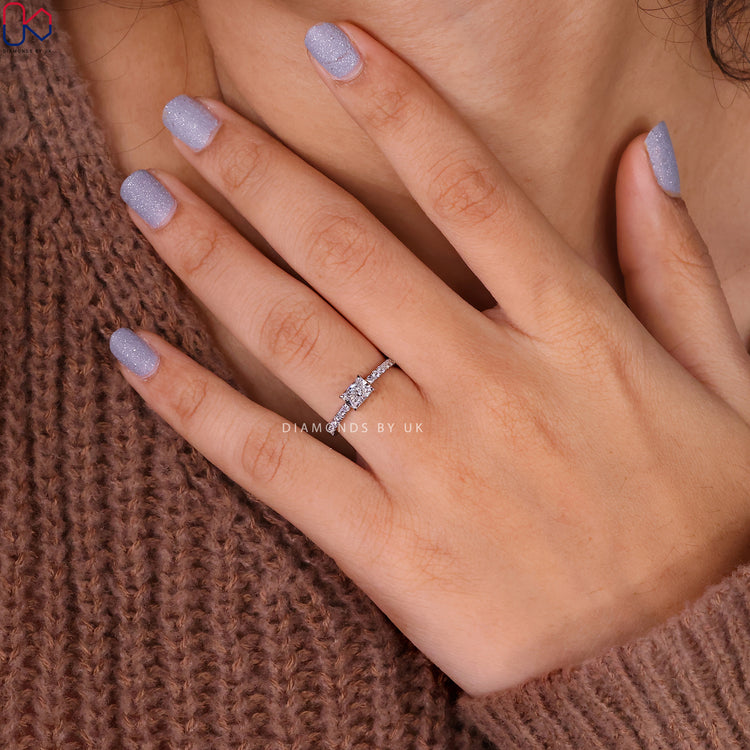 Customize ring with radiant cut diamond and pave side stones.
