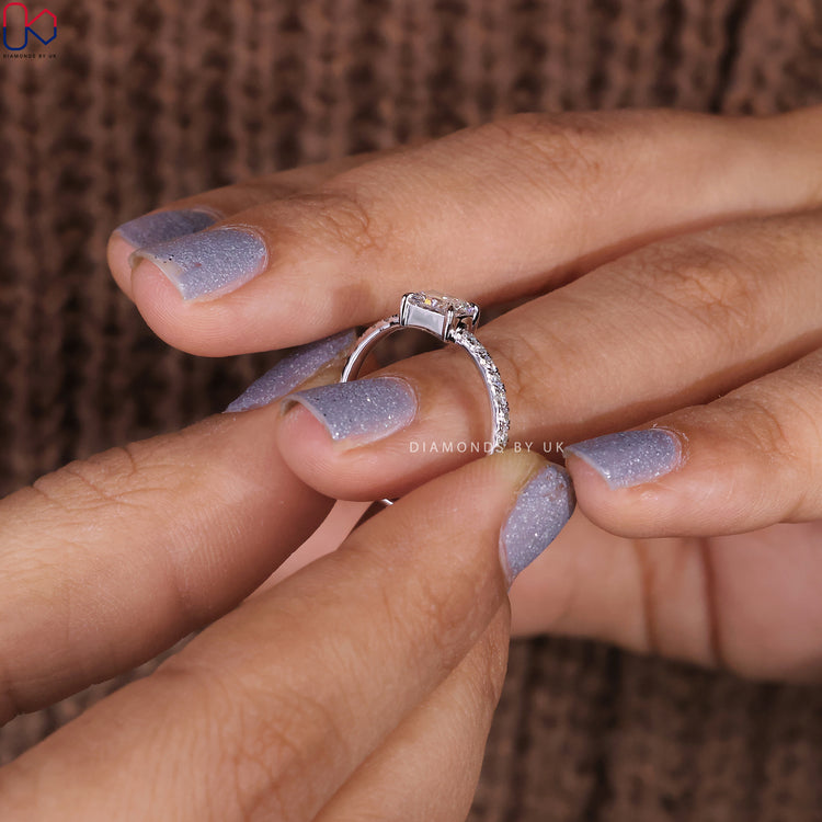 IGI certified radiant cut diamond ring in white gold setting.
