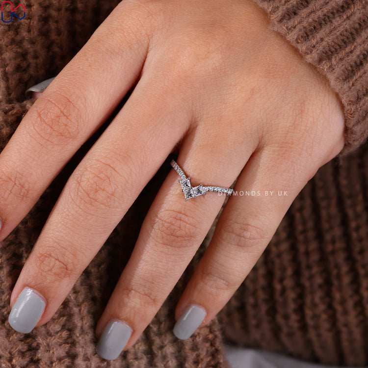 Prong set wedding band and chevron diamond band for daily wear.