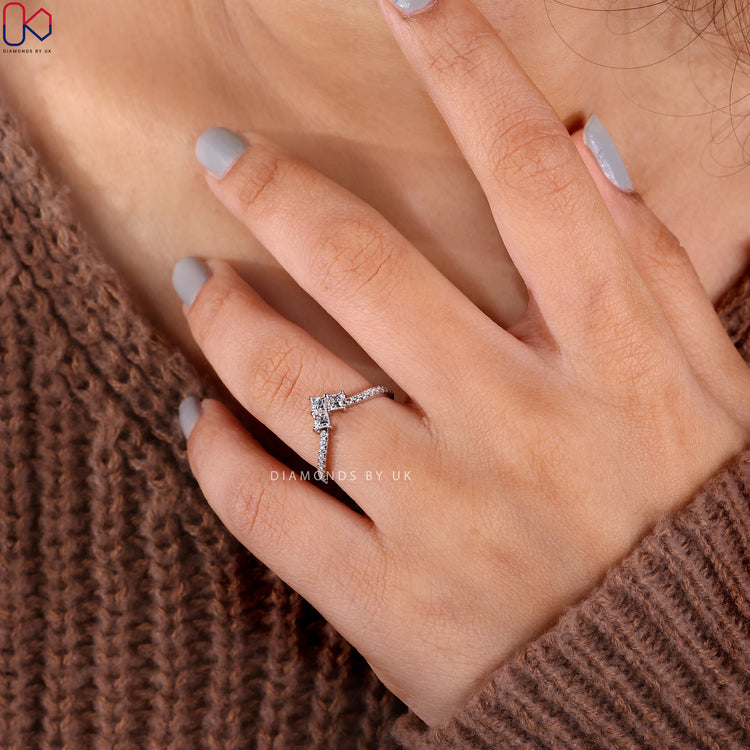 Handmade jewellery with chevron diamond band and white gold setting.