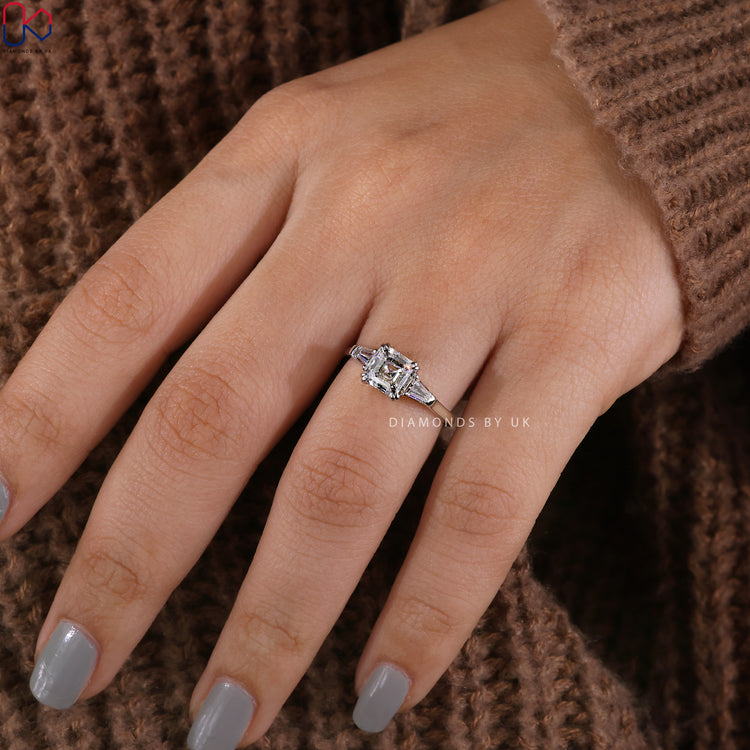 3 Stone Diamond Ring with IGI Certified stones set in handmade white gold.
