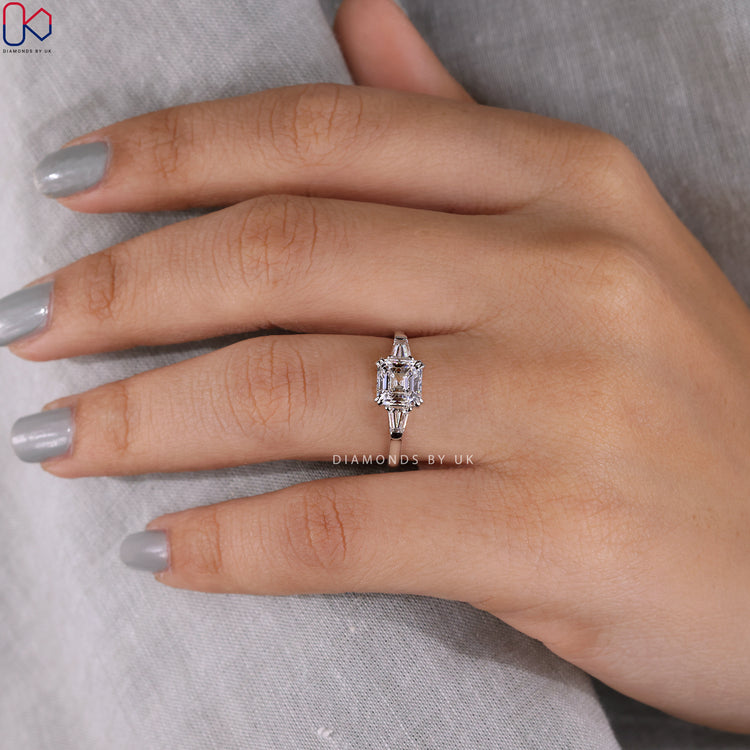 Tapered Baguette Diamond Ring with a sleek white gold band.
