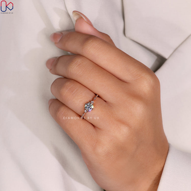 Diamondsbyuk engagement ring with timeless charm.
