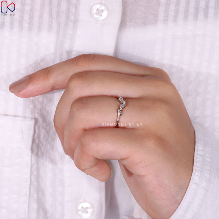 White gold diamond wedding band with brilliant diamonds for lasting beauty.
