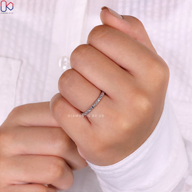 Stunning baguette and round wedding band with unique sparkle.
