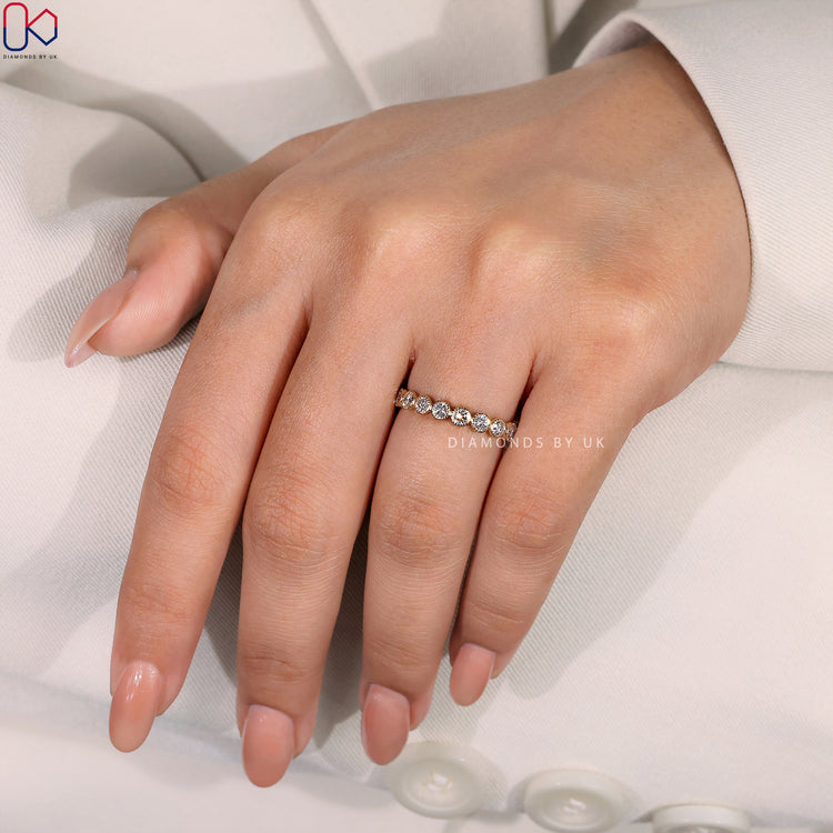 Full diamond band with sparkling diamonds set around the entire ring.
