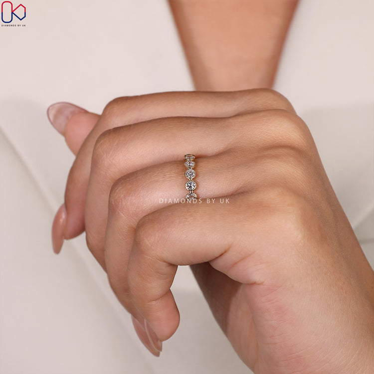 Milgrain band with diamond eternity design for a vintage-inspired look.
