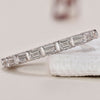 Elegant Baguette Diamond Band featuring sleek baguette diamonds set in a modern design.
