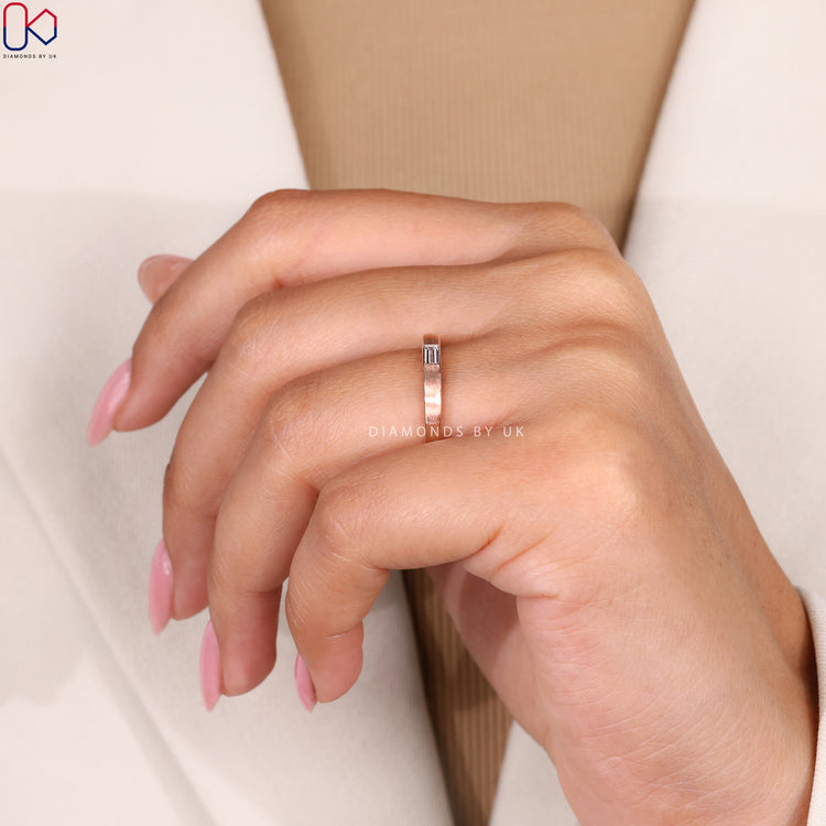 Dainty wedding band featuring handmade jewellery details.
