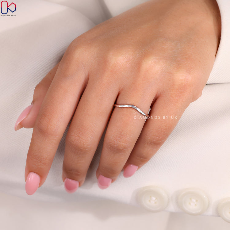 Classic white gold band for timeless beauty.
