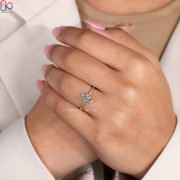 Diamondsbyuk ring with a hidden halo and round diamond setting.